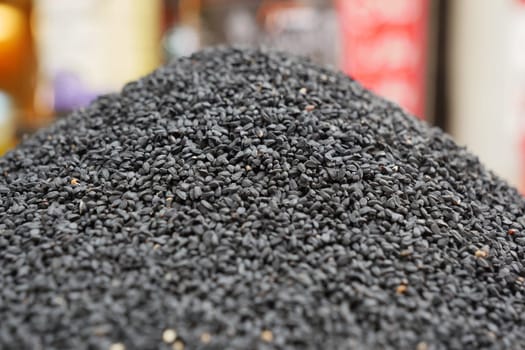 Close-Up of Black Sesame Seeds in a Market Display,