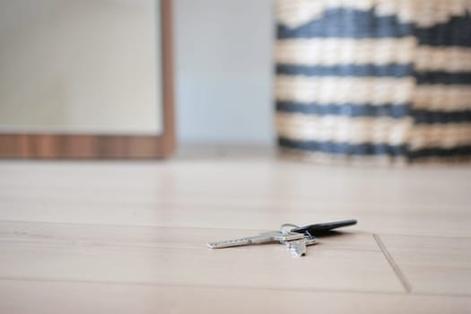 house keys on the ring on table in a room. Bunch of apartment keys. To forget keys at home concept ,