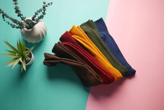 A vibrant assortment of colorful socks has been arranged neatly for everyone to admire