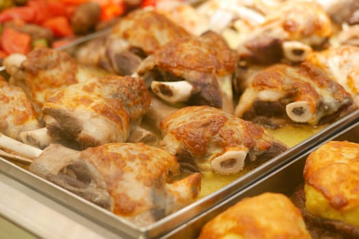 Succulent roasted meat dishes beautifully arranged, perfect for festive gatherings and celebrations