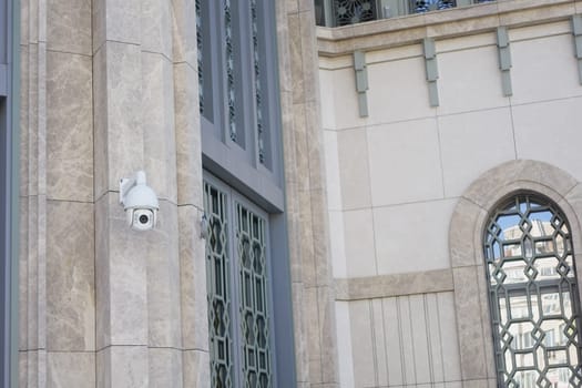 A wallmounted security camera offering extensive surveillance for diverse needs and locations