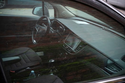 Cremona, Lombardy, Italy - October 27th 2024 Clean, modern interior of an opel mokka x suv, highlighting the dashboard, steering wheel, and infotainment system