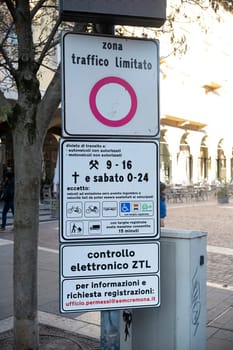 Cremona, Italy - November 27th 2024 Road sign in cremona, italy, indicating a limited traffic zone (ztl) with electronic monitoring and access restrictions
