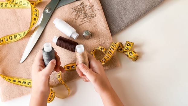 Creative sewing essentials. Threads, needles, and tools for tailoring.