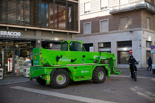 Cremona, Lombardy, Italy - October 27th 2024 Merlo roto 38.16 s plus telehandler, with a kubota v3800-cr-te4 engine, parked on a city street