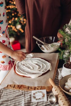 kitchen with a Christmas tree is preparing or cooking ginger cookies for Christmas or New year