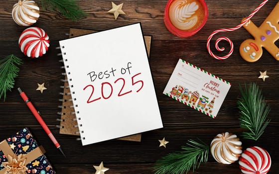 Top-down view of a Best of 2025 notebook with holiday card and festive treats, ideal for end-of-year themed visuals.