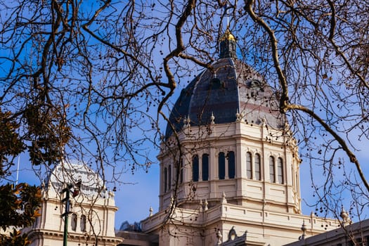 MELBOURNE, AUSTRALIA - AUGUST 1, 2024: Royal Exhibition Building in Carlton Gardens on a clear sunny winter's day in Melbourne Australia