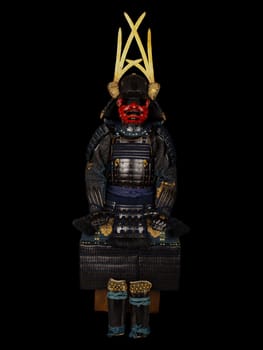 Antique Japanese Rokudo Gusoku Armor with Box from the late 17th century, featuring a helmet, chestplate, sleeves, thigh guards, and boots.