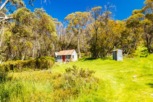The historic Horse Camp Hut in Kosciuszko National Park near Schlink Pass on a clear summer's day, in the Snowy Mountains, New South Wales, Australia
