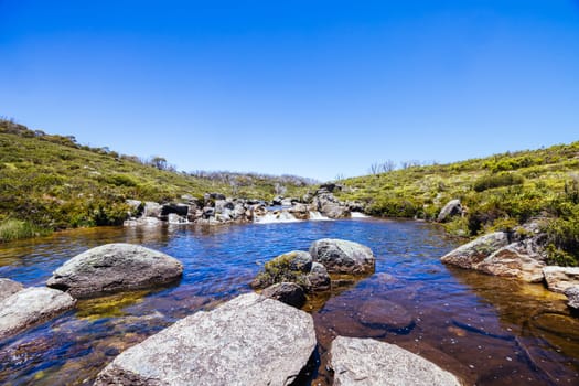 Landscape in Kosciuszko National Park near Valentine Hut on a clear summer's day, in the Snowy Mountains, New South Wales, Australia