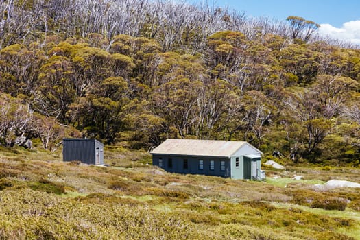The historic Schlink Hut in Kosciuszko National Park near Schlink Pass on a clear summer's day, in the Snowy Mountains, New South Wales, Australia