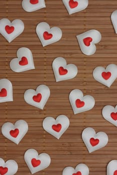 Valentine's Day pattern with red and white hearts. Love card for Valentine's Day.