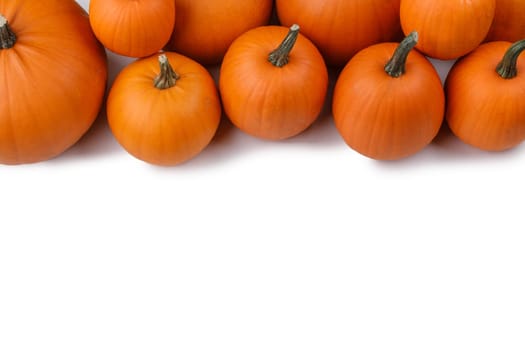 Autumn frame made of many colorful pumpkins isolated on white background. Fall, Halloween and Thanksgiving concept. Styled stock flat lay, Top view. Empty copy space for text