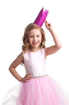 Happy small princess girl in pink Halloween dress and crown isolated on white background