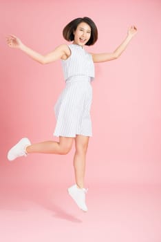 Vertical full length body size studio photo portrait of cute cool free fresh charming pretty attractive lady in light blue clothing feeling expressing happiness isolated bright pastel soft background