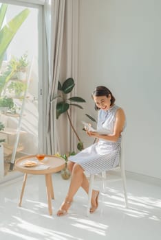 beautiful asian woman reading a book