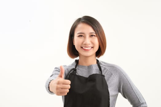 young attractive asian woman who cooks