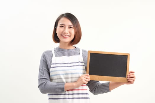 Asian woman wearing apron on white isolated background