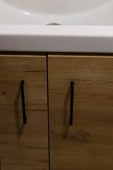 Shot of the cabinet under the sink in the bathroom