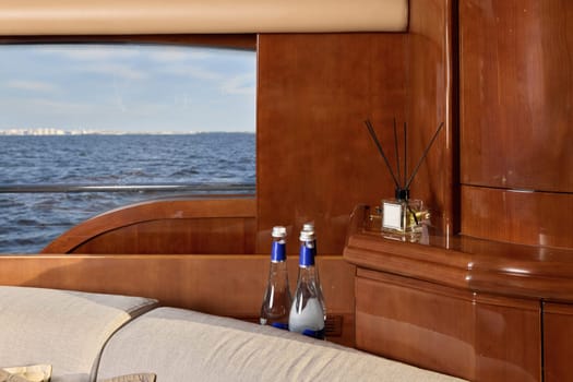 The luxurious yacht interior beautifully showcases elegant decor and offers breathtaking serene ocean scenery