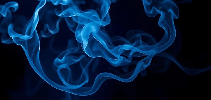 Swirling blue smoke dances elegantly against a stark black backdrop, creating an ethereal and mystical mood. The intricate patterns and fluid movement evoke a sense of mystery and wonder.