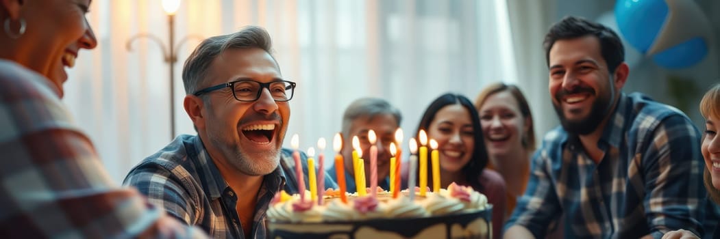 A group of friends enjoys a lively birthday celebration indoors, sharing laughter and smiles around a beautifully decorated cake with candles lit, creating a warm atmosphere.