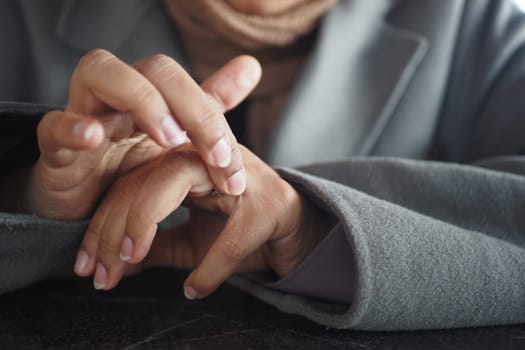 Young women hands suffering wrist pain,