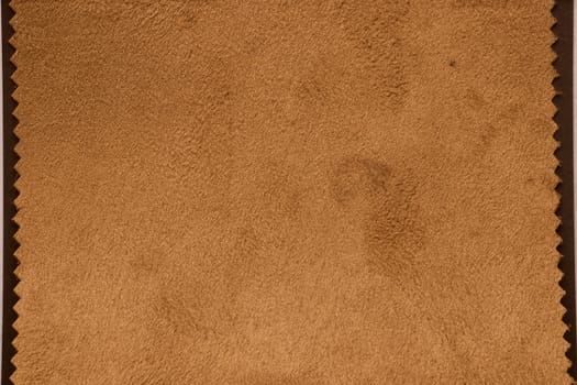 This soft, luxurious brown suede fabric is ideal for upholstery projects and fashion design applications