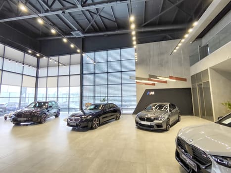 Tumen, Russia - November 09, 2024: Car in nice showroom of dealership BMW