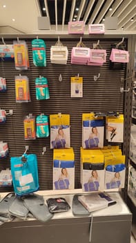 15 October 2024 Tel-Aviv Israel Ben Gurion airport, duty free shop,accessories for tourists, tourism objects, commerce shelf showcase. High quality editorial photo