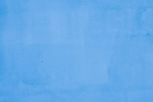Blue stone wall background. Worn blue plaster on a concrete wall.