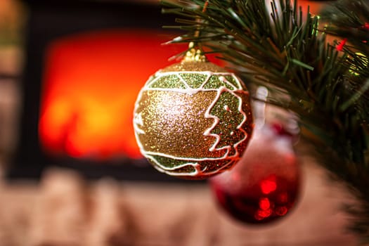 Beautiful festive decorations on the Christmas tree. Close-up. Beautiful Christmas background. The concept of decorations and decor for the new year. New Year's Card 2025. High quality photo