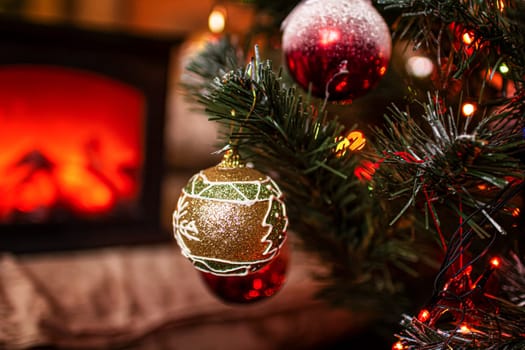 Beautiful festive decorations on the Christmas tree. Close-up. Beautiful Christmas background. The concept of decorations and decor for the new year. New Year's Card 2025. High quality photo