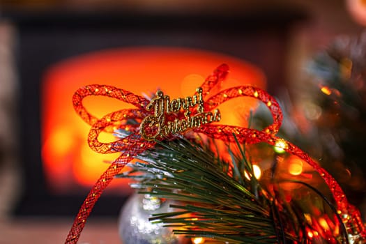 Beautiful festive decorations on the Christmas tree. Close-up. Beautiful Christmas background. The concept of decorations and decor for the new year. New Year's Card 2025. High quality photo