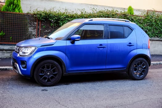 Cremona, Itally - October 6th 2024 Parked blue suzuki ignis 1.2 dualjet hybrid allgrip, a compact suv perfect for city driving and light off-road adventures