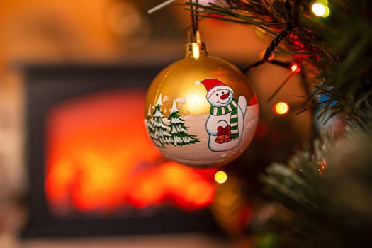 Beautiful festive decorations on the Christmas tree. Close-up. Beautiful Christmas background. The concept of decorations and decor for the new year. New Year's Card 2025. High quality photo