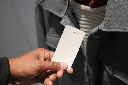 Blank price tag on shirt .