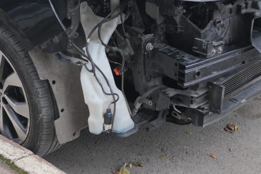 car damaged by a road accident .