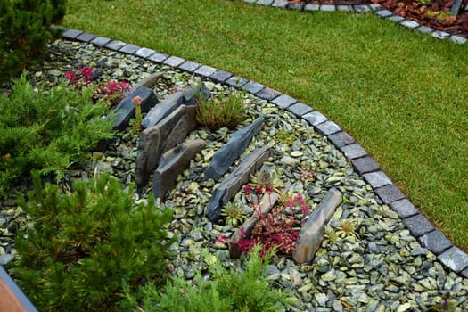 A tranquil and serene graveyard scene featuring stones and lush greenery, perfect for deep reflective moments