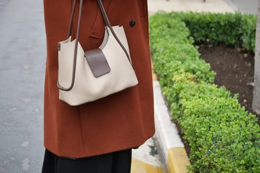 women with stylish casual purse .