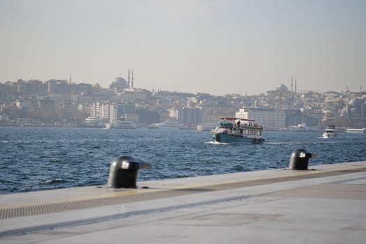 A stunningly beautiful view of Istanbuls picturesque waterfront featuring boats sailing serenely