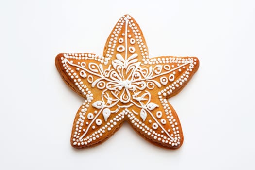 A beautifully decorated starshaped gingerbread cookie that is truly adorned with intricate and beautiful icing,
