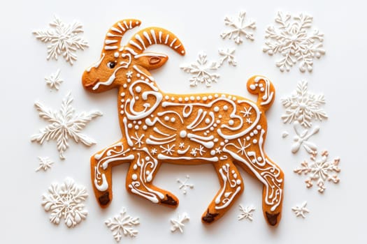 A stunningly decorated gingerbread goat that is elegantly displayed amidst whimsical, festive snowflakes