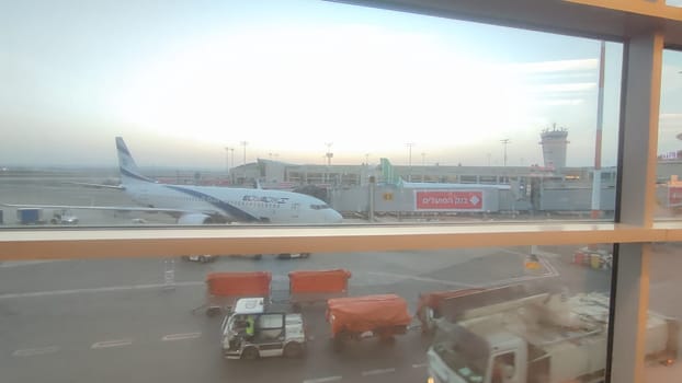 15 October 2024 Tel-Aviv Israel Ben Gurion airport, Terminal 3, aircraft departures board, tourist lounge, window view travel tourism, plane,quality photo