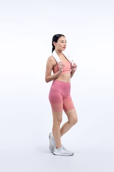 Full body asian woman in sportswear portrait, smiling and posing cheerful gesture. Workout training with attractive girl engage in her pursuit of healthy lifestyle. Isolated background Vigorous