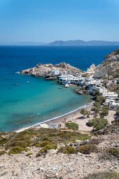 View of Paralia Firopotamos beach next to the Church of Agios Nikolaos church in Milos