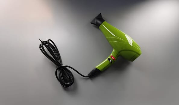 Green hair dryer on a gray background, top view, close-up. Professional equipment for a hairdresser, hair styling