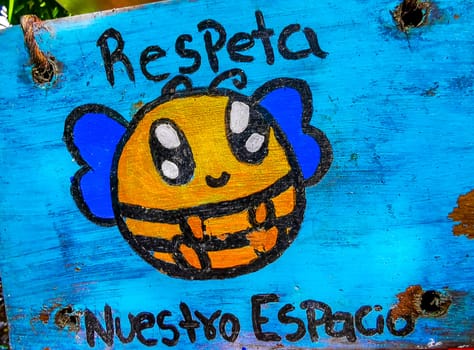 Colorful park signs sign and information about melipona bee bees in Playa del Carmen Quintana Roo Mexico.