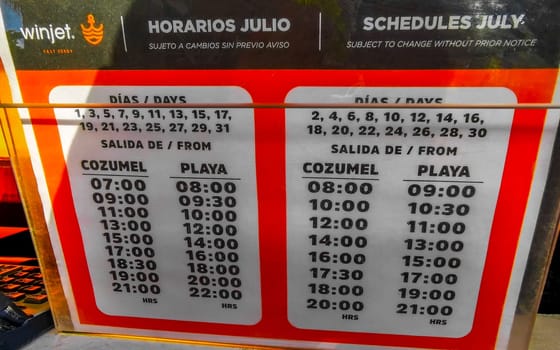 Ferry boat time table timetable schedules in Playa del Carmen Quintana Roo Mexico.